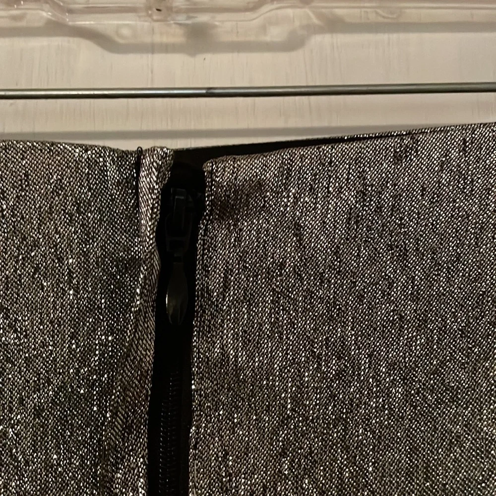 H&M silver shiny mini skirt. Size8 I put it with a shirt I’m selling too see 👀 - Picture 5 of 11